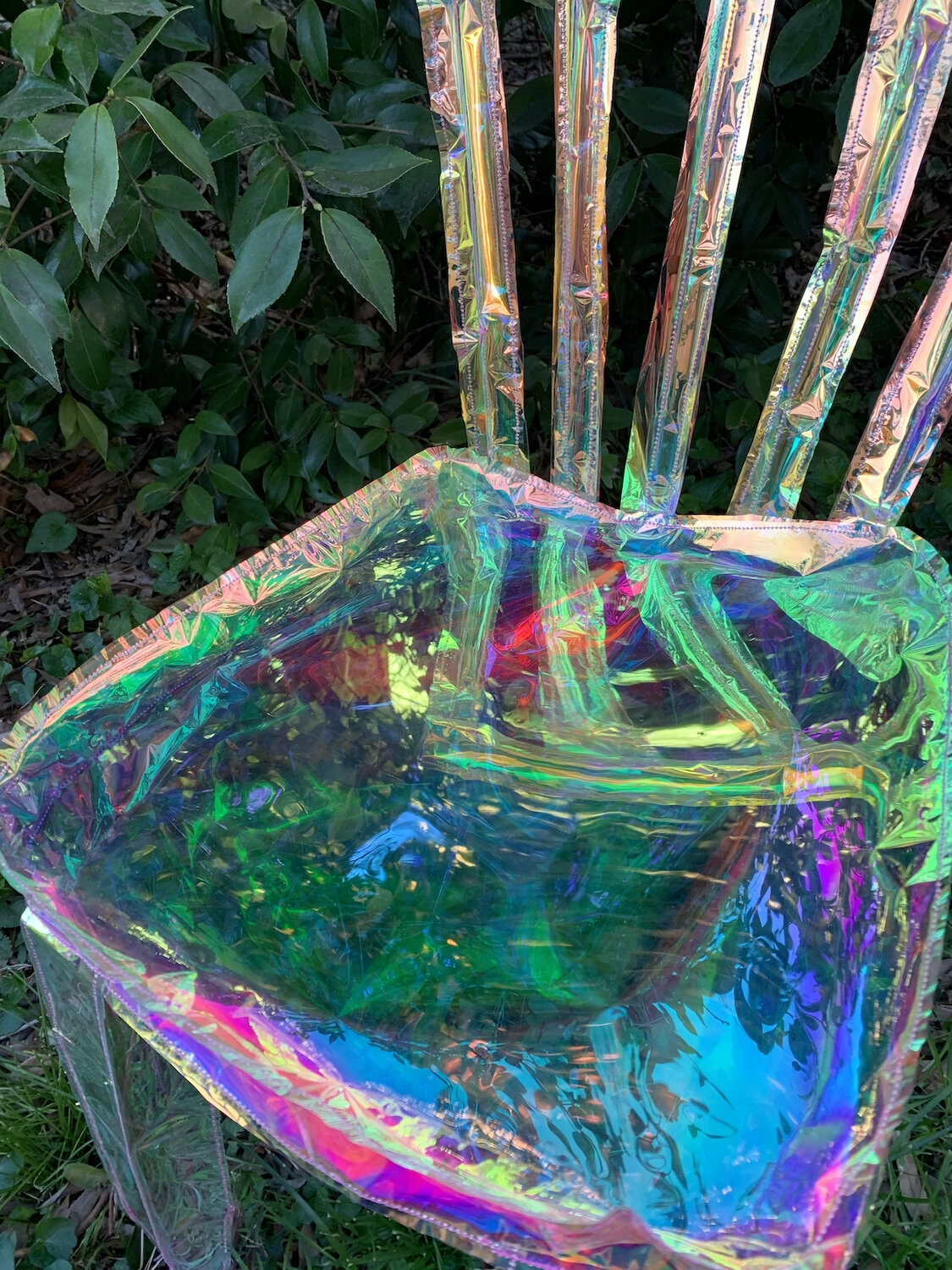 irridescent, plastic chair