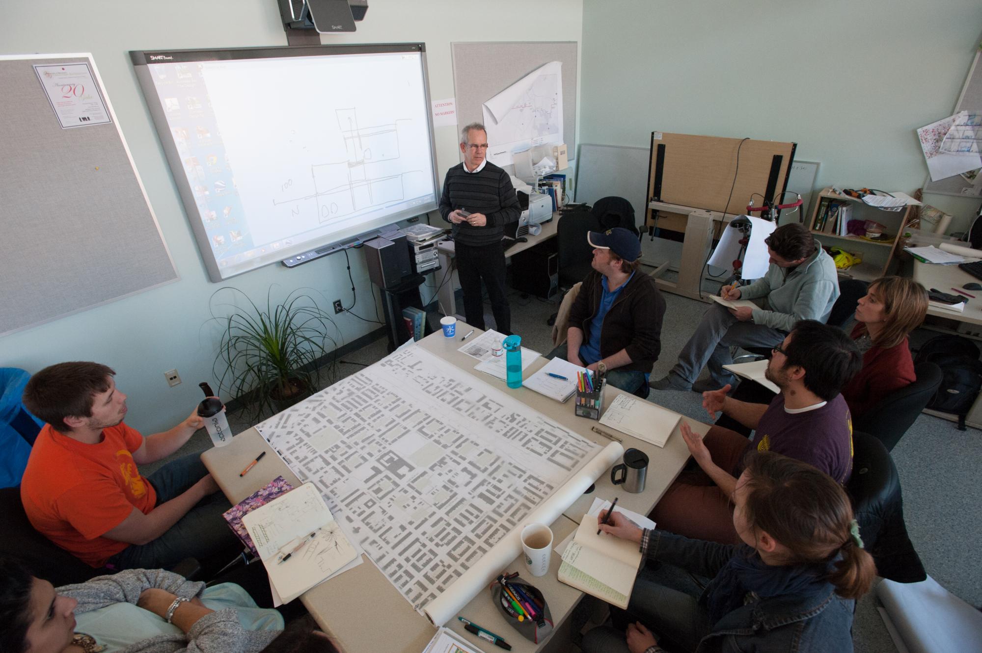 Students and Professor in studio.