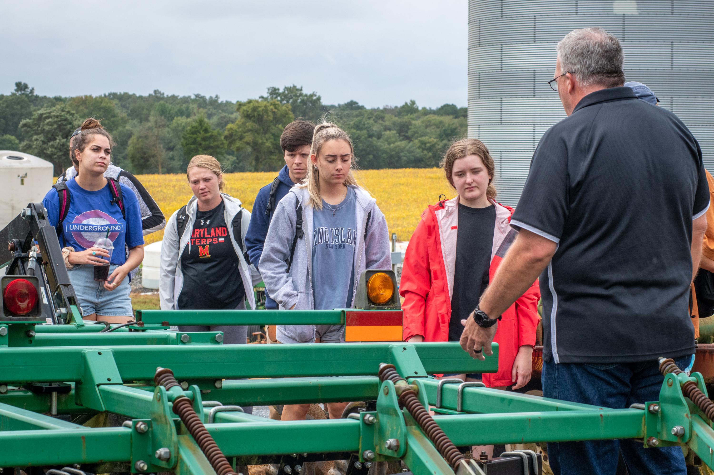 Students and professor out in the field.